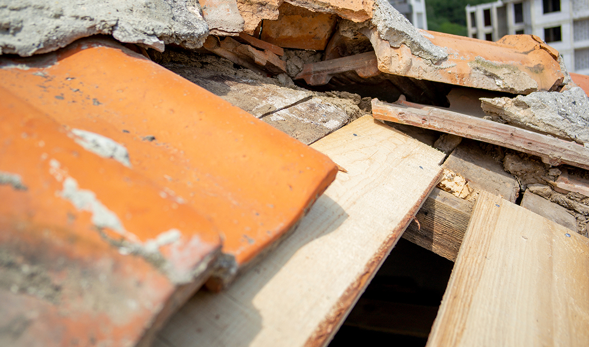 Emergency Roof Repair Services: Quick Solutions for Homeowner 7 Roof Repair Close Up Cracked Ceramic Tiles On Roof Need To Be Replaced